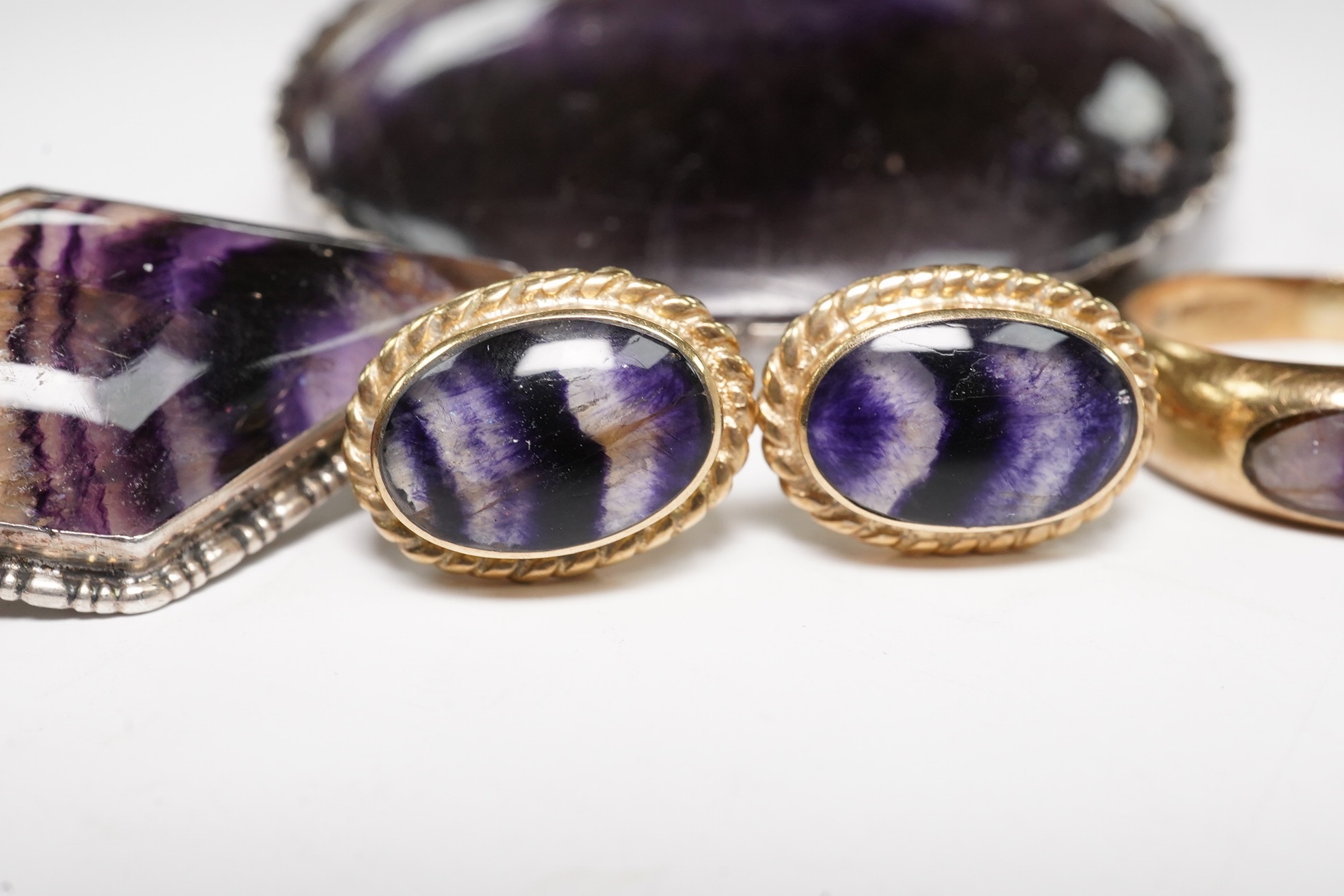 Four items of Blue John set jewellery including a pair of 9ct earrings and a 9ct ring. Condition - poor to fair